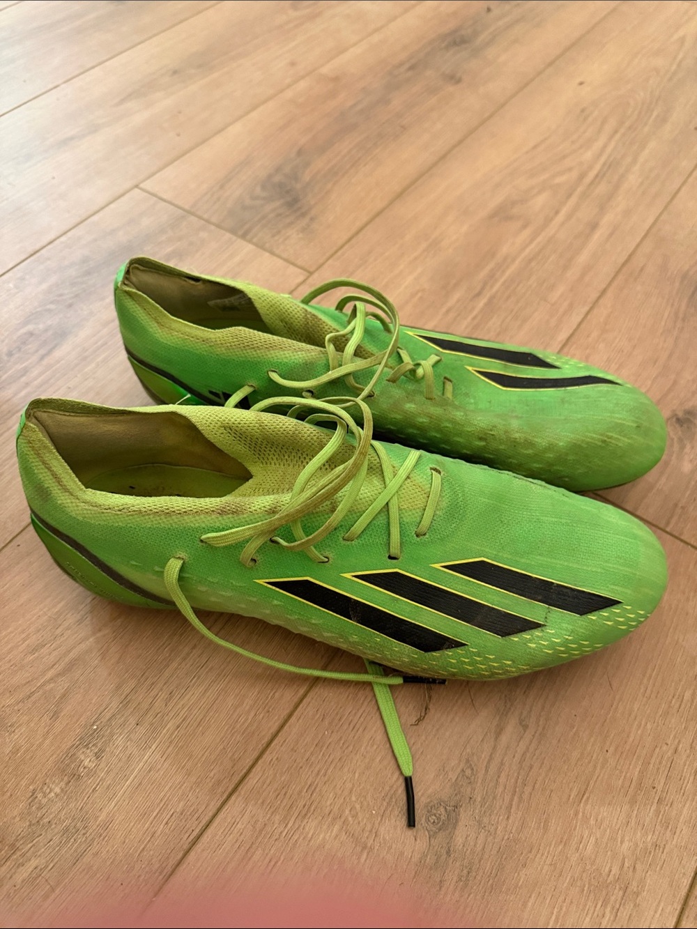 adidas Men’s Bright Green Soccer Cleats with Black Stripes